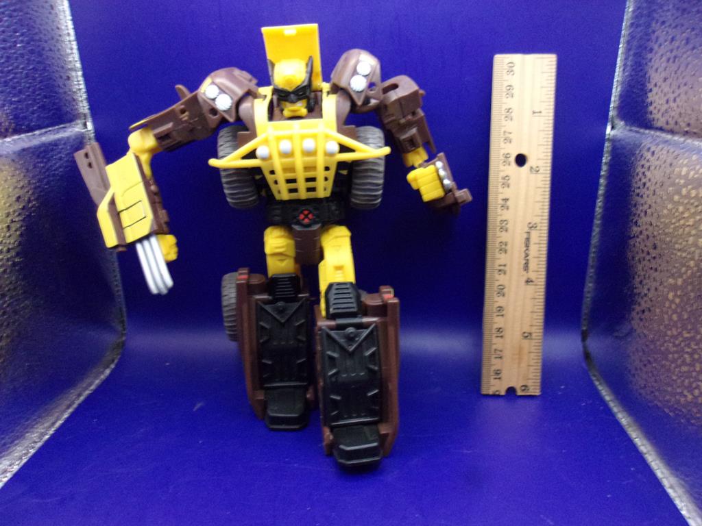 2009 transformers crossover wolverine brown and tan varient complete rare (image for) 2009 transformers crossover wolverine brown and tan varient complete rare